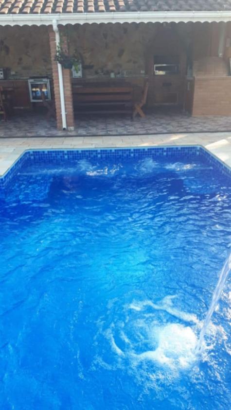 Oportunidade Imperdível: Casa em Condomínio 1100m², Piscina, Pomar e Área Gourmet - www.melhoresimoveisonline.com.br